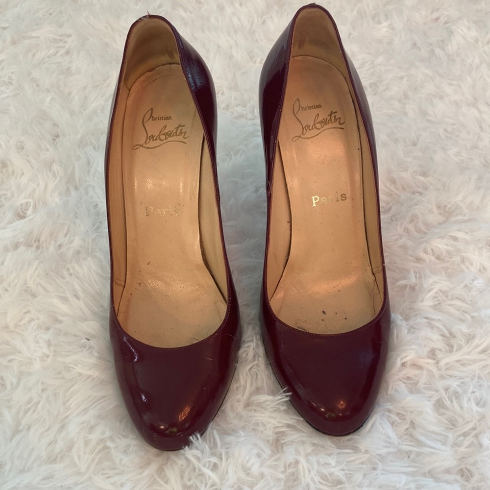 Burgundy Christian Louboutin almond toe pump